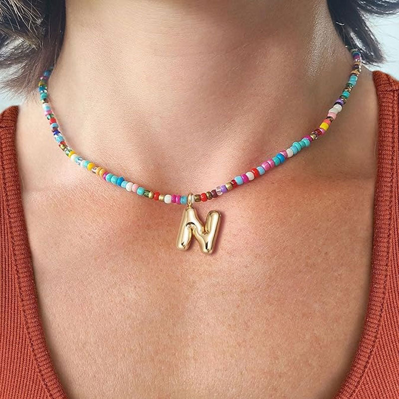 Initialhalskæde med perler