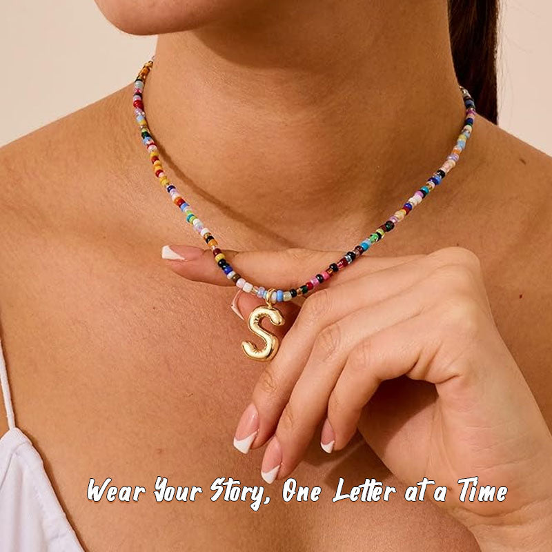 Initialhalskæde med perler