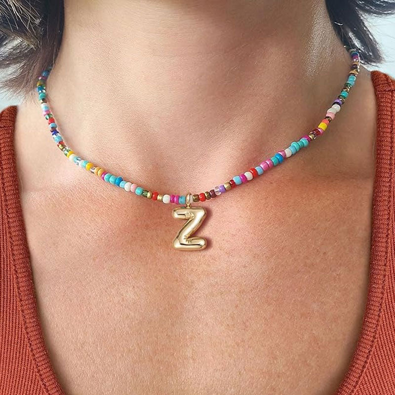 Initialhalskæde med perler