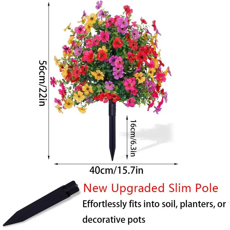 Blomsterdekoration med kunstige eukalyptus- og violer, der stikkes ned i jorden