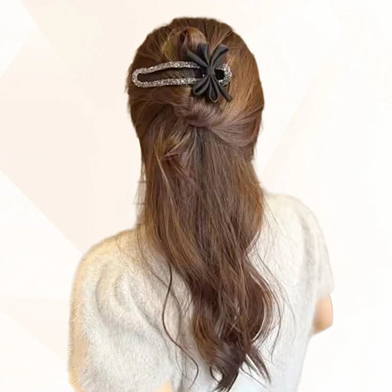 Glitrende elegante sorte sløjfehårspænder