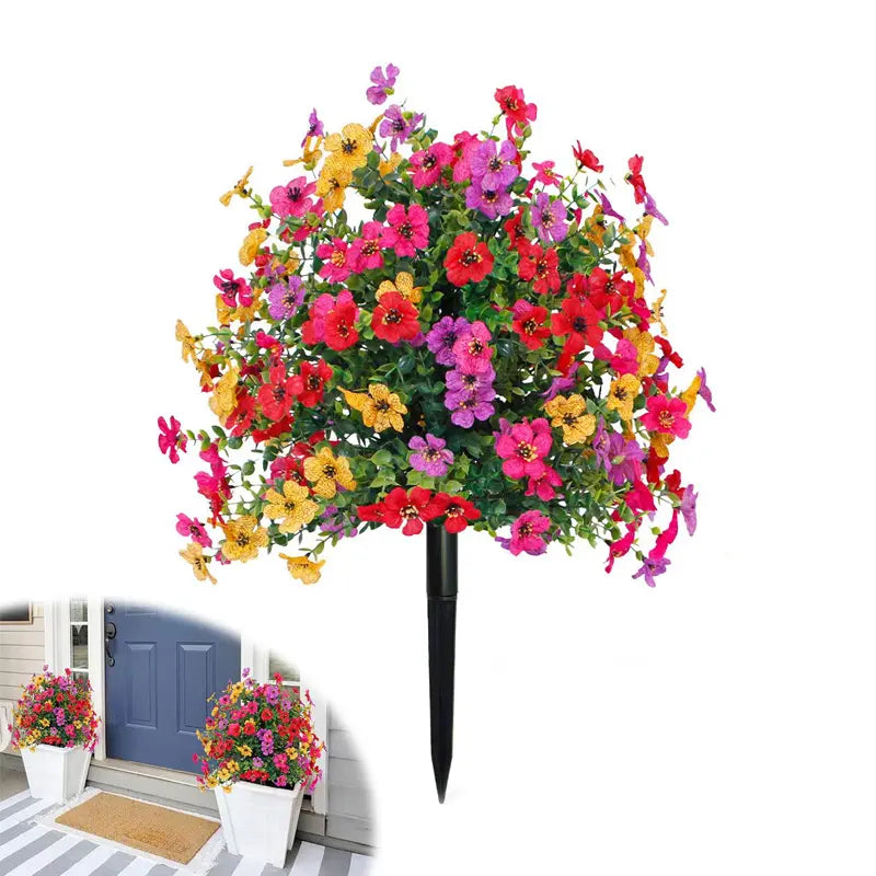 Blomsterdekoration med kunstige eukalyptus- og violer, der stikkes ned i jorden