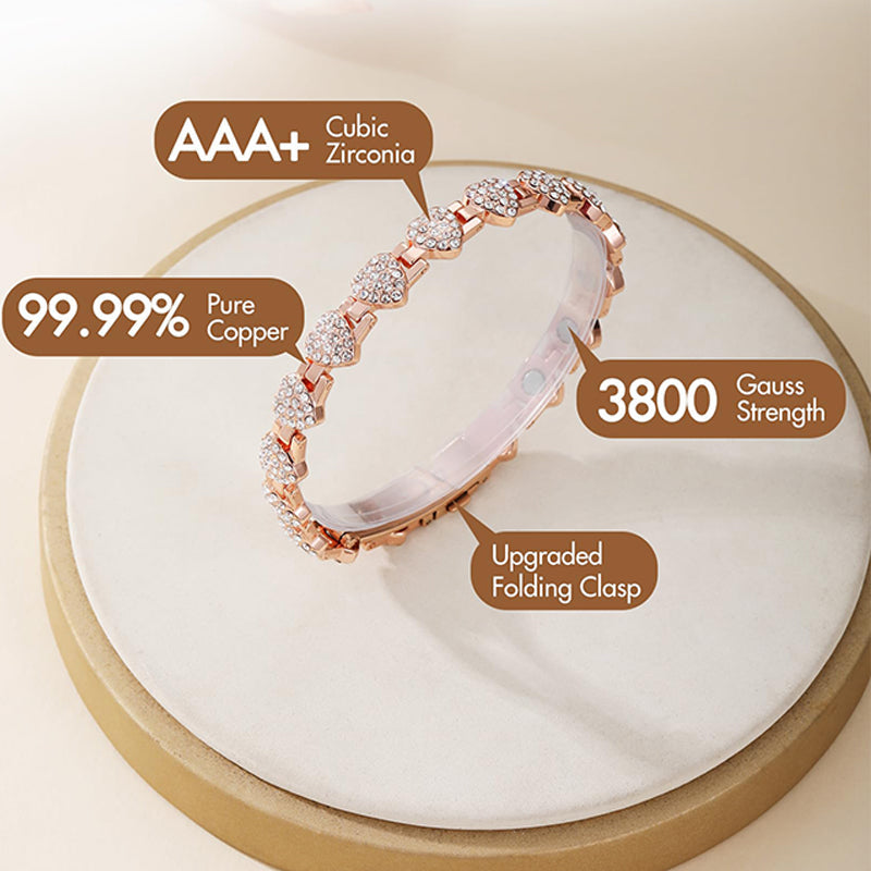 Kvinders blændende hjerteformede magnetiske kobberarmbånd