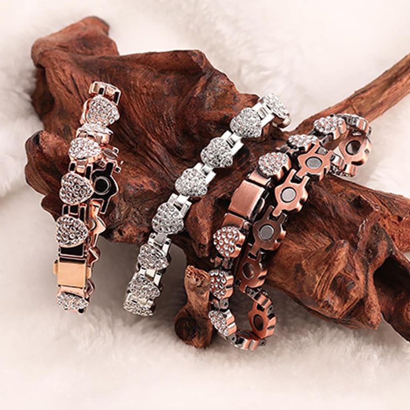 Kvinders blændende hjerteformede magnetiske kobberarmbånd