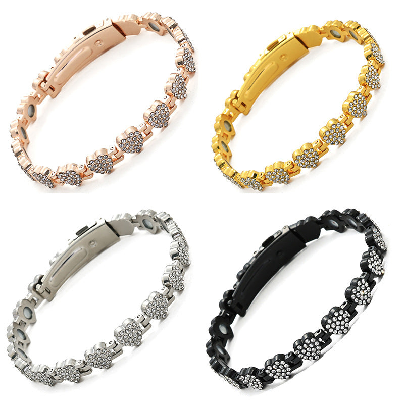 Kvinders blændende hjerteformede magnetiske kobberarmbånd